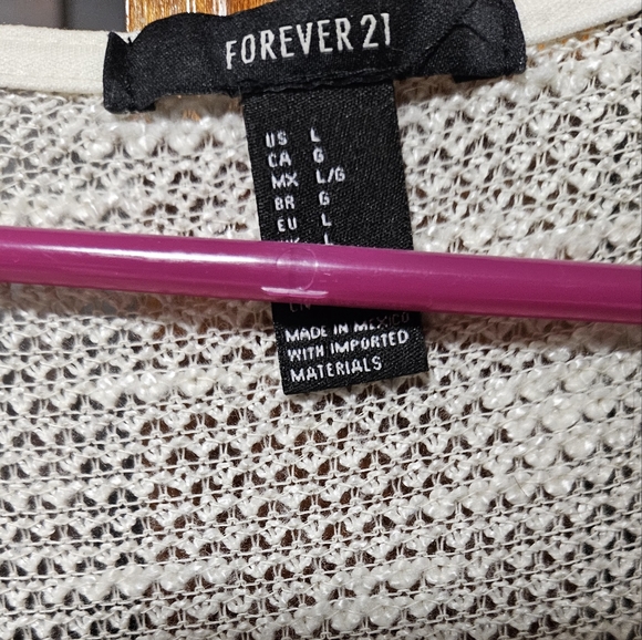 Flowy oversized cardigan with detailed design on hem. - Picture 2 of 3